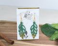 Witchy Leaves wooden earrings.